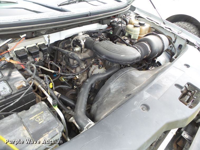 image for item FL9313 2006 Ford F150 utility bed pickup truck