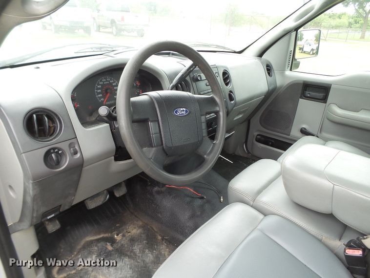 image for item FL9313 2006 Ford F150 utility bed pickup truck