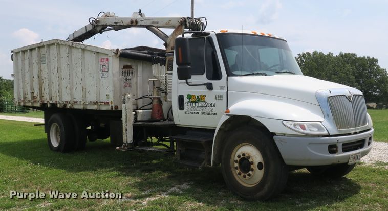 image for item DB10240 2003 International 4300 waste material handling truck