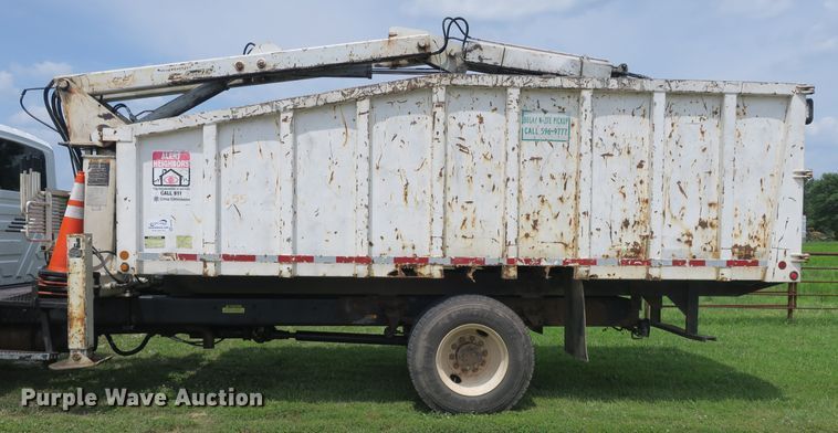 image for item DB10240 2003 International 4300 waste material handling truck