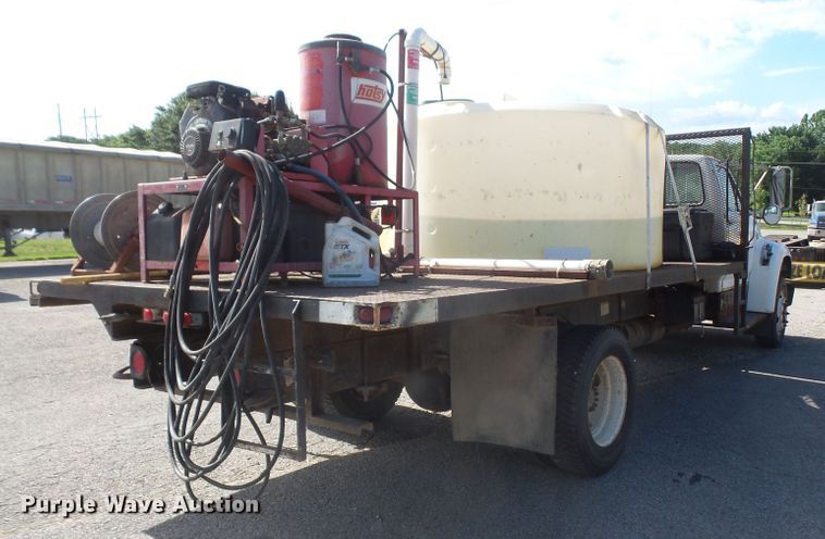 image for item DD6296 1998 Ford F700 flatbed truck with pressure washer