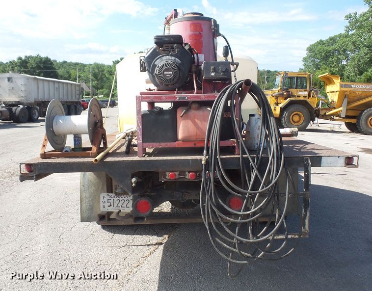 image for item DD6296 1998 Ford F700 flatbed truck with pressure washer