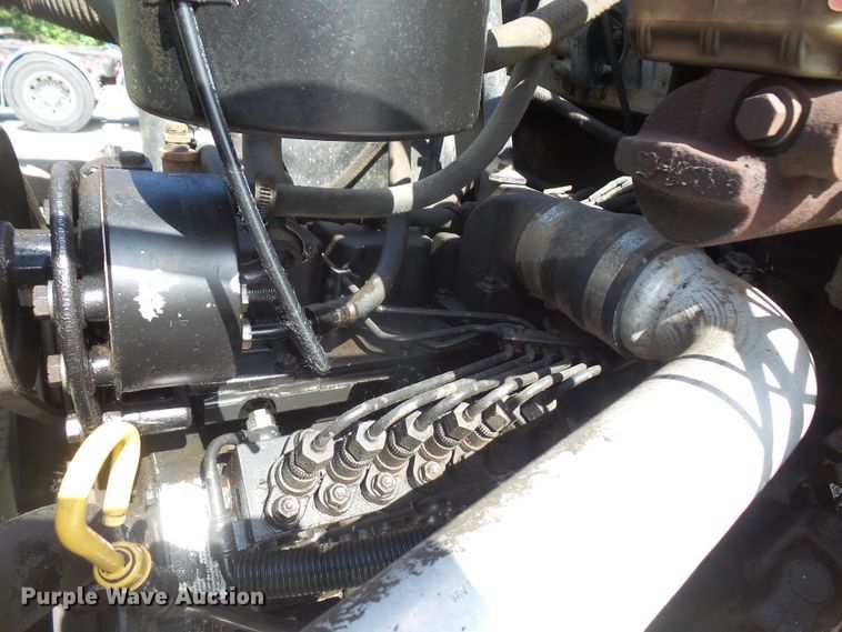 image for item DD6296 1998 Ford F700 flatbed truck with pressure washer