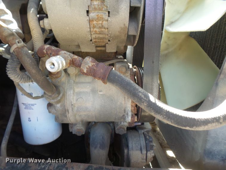 image for item DD6296 1998 Ford F700 flatbed truck with pressure washer