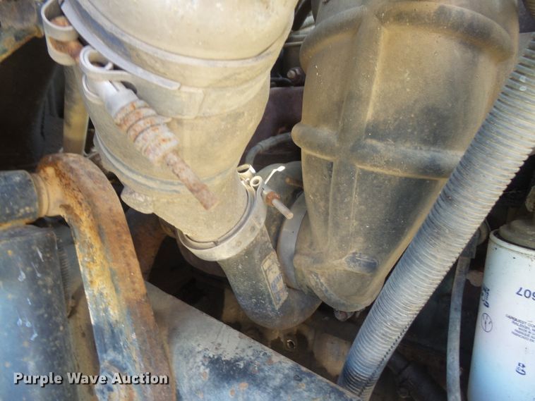 image for item DD6296 1998 Ford F700 flatbed truck with pressure washer