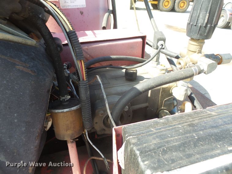 image for item DD6296 1998 Ford F700 flatbed truck with pressure washer