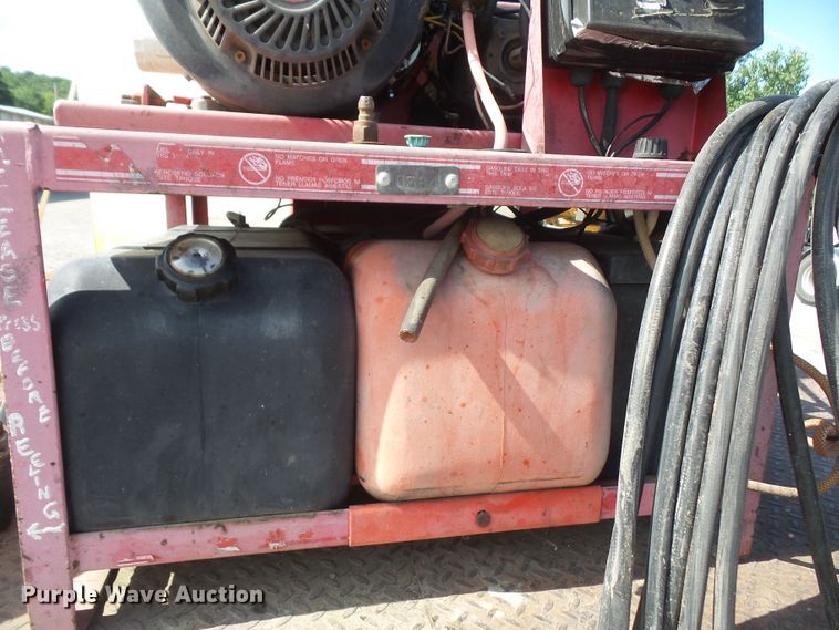 image for item DD6296 1998 Ford F700 flatbed truck with pressure washer