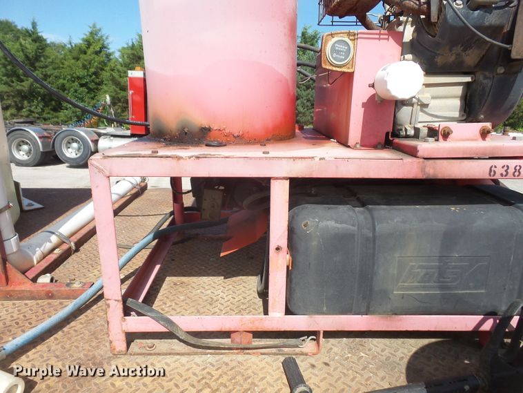 image for item DD6296 1998 Ford F700 flatbed truck with pressure washer