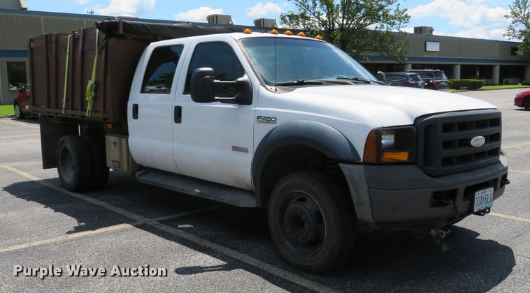 image for item DE8242 2006 Ford F450 Super Duty XL Crew Cab flat dump bed truck