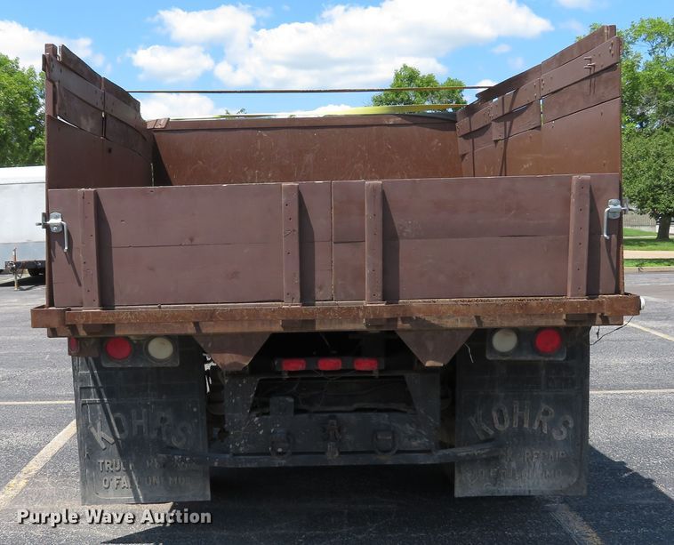 image for item DE8242 2006 Ford F450 Super Duty XL Crew Cab flat dump bed truck