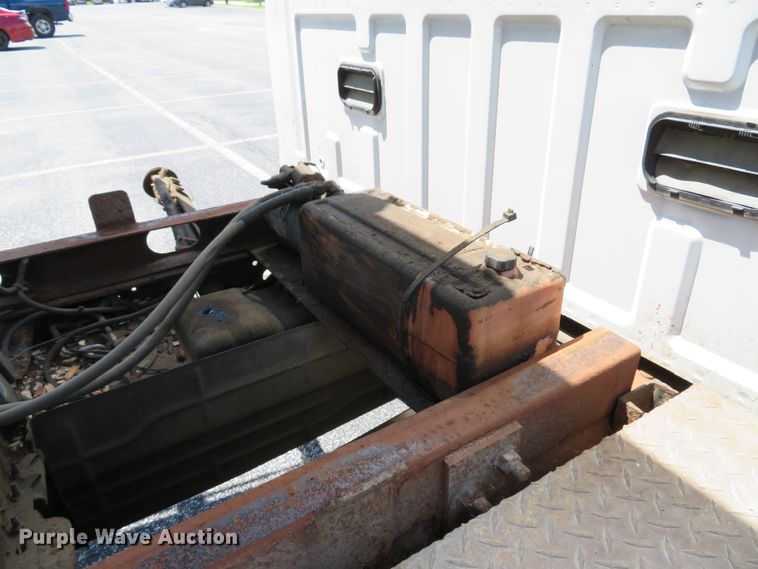 image for item DE8242 2006 Ford F450 Super Duty XL Crew Cab flat dump bed truck