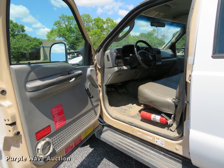 image for item DE8242 2006 Ford F450 Super Duty XL Crew Cab flat dump bed truck