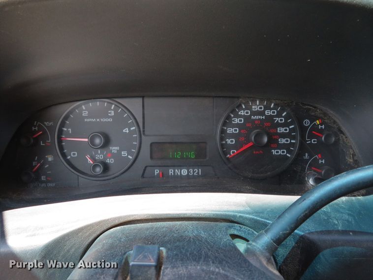 image for item DE8242 2006 Ford F450 Super Duty XL Crew Cab flat dump bed truck