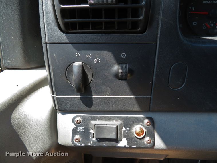 image for item DE8242 2006 Ford F450 Super Duty XL Crew Cab flat dump bed truck