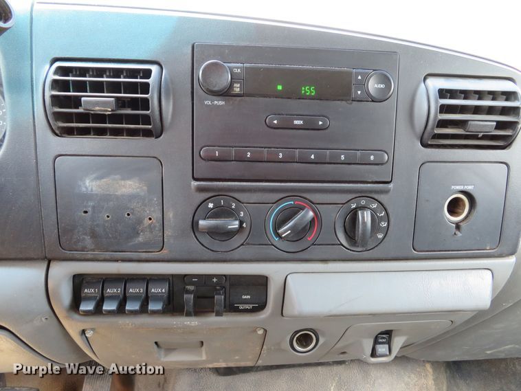 image for item DE8242 2006 Ford F450 Super Duty XL Crew Cab flat dump bed truck