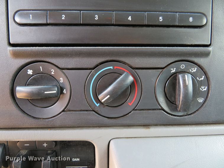 image for item DE8242 2006 Ford F450 Super Duty XL Crew Cab flat dump bed truck