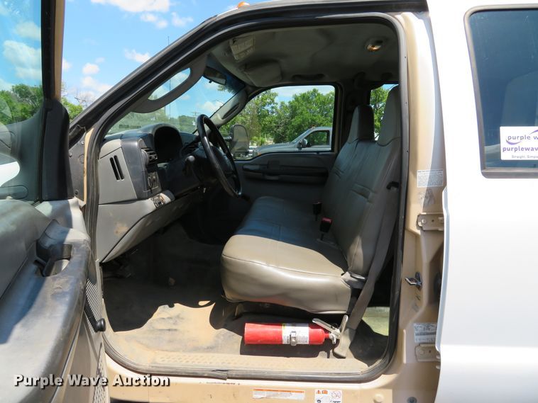 image for item DE8242 2006 Ford F450 Super Duty XL Crew Cab flat dump bed truck