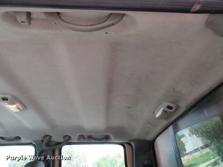 image for item DE8242 2006 Ford F450 Super Duty XL Crew Cab flat dump bed truck