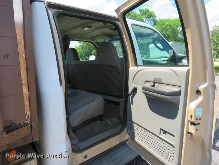 image for item DE8242 2006 Ford F450 Super Duty XL Crew Cab flat dump bed truck