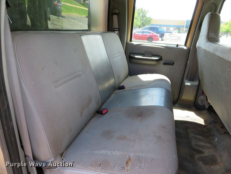 image for item DE8242 2006 Ford F450 Super Duty XL Crew Cab flat dump bed truck