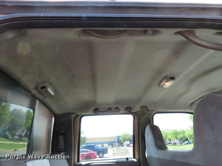 image for item DE8242 2006 Ford F450 Super Duty XL Crew Cab flat dump bed truck