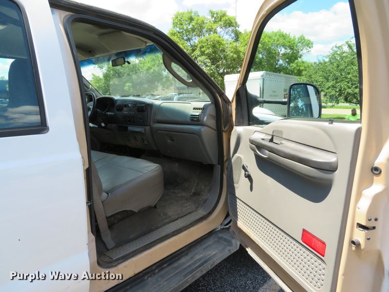 image for item DE8242 2006 Ford F450 Super Duty XL Crew Cab flat dump bed truck