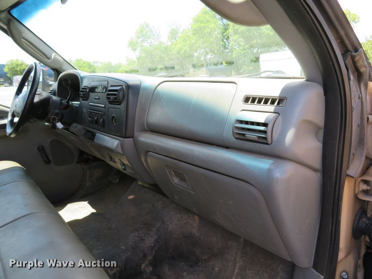 image for item DE8242 2006 Ford F450 Super Duty XL Crew Cab flat dump bed truck