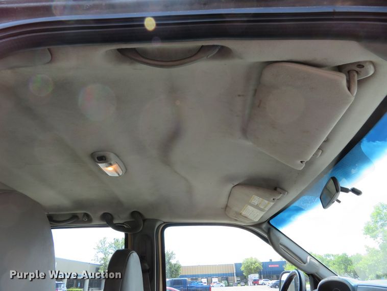 image for item DE8242 2006 Ford F450 Super Duty XL Crew Cab flat dump bed truck