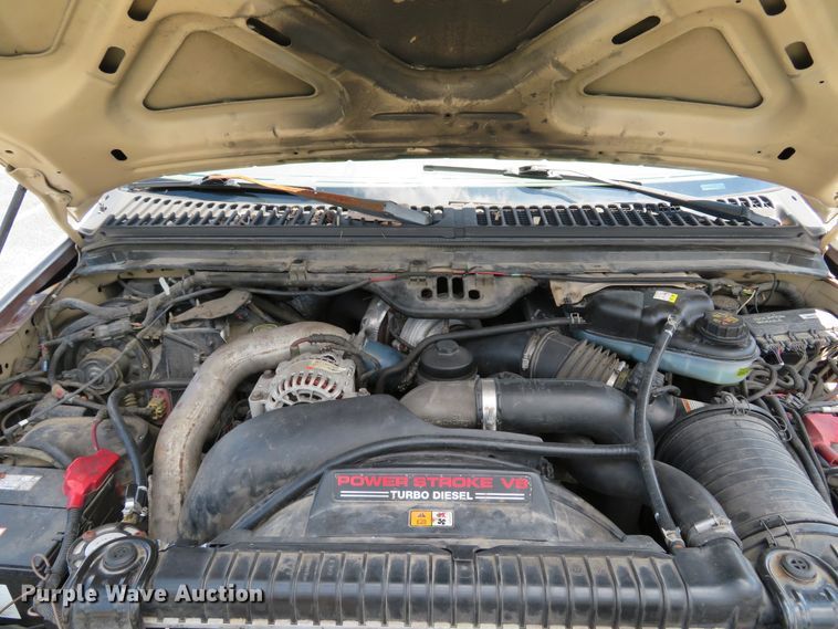 image for item DE8242 2006 Ford F450 Super Duty XL Crew Cab flat dump bed truck