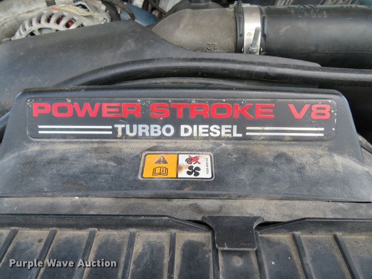 image for item DE8242 2006 Ford F450 Super Duty XL Crew Cab flat dump bed truck