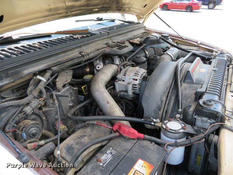 image for item DE8242 2006 Ford F450 Super Duty XL Crew Cab flat dump bed truck