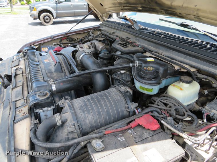 image for item DE8242 2006 Ford F450 Super Duty XL Crew Cab flat dump bed truck