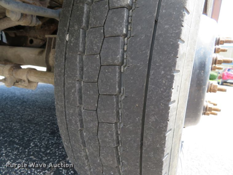 image for item DE8242 2006 Ford F450 Super Duty XL Crew Cab flat dump bed truck