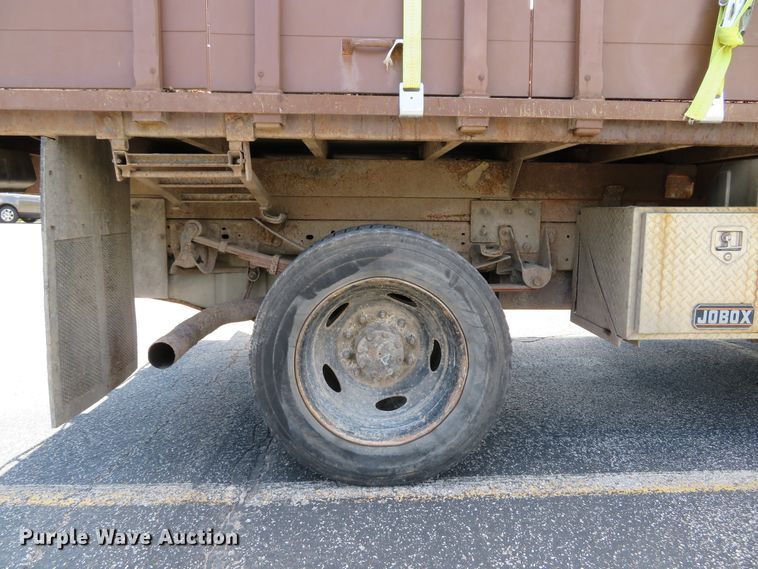 image for item DE8242 2006 Ford F450 Super Duty XL Crew Cab flat dump bed truck