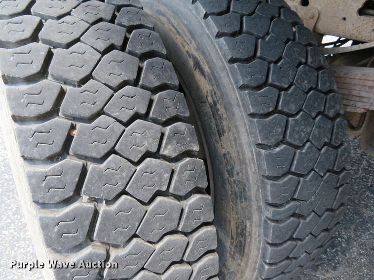 image for item DE8242 2006 Ford F450 Super Duty XL Crew Cab flat dump bed truck