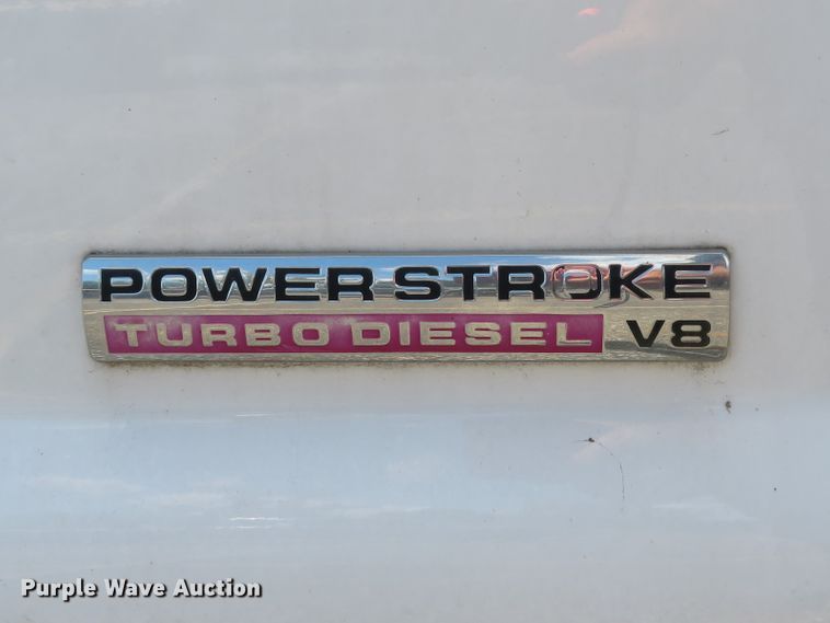 image for item DE8242 2006 Ford F450 Super Duty XL Crew Cab flat dump bed truck