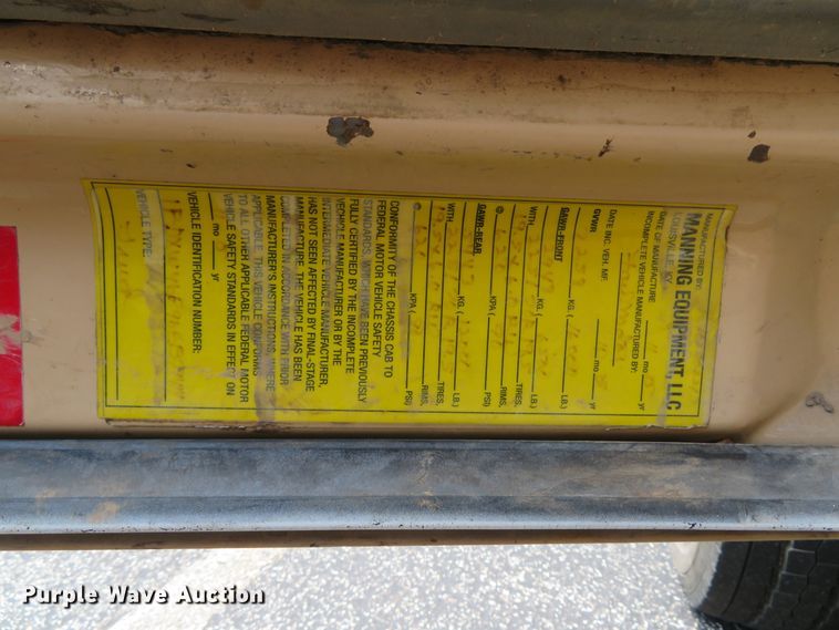 image for item DE8242 2006 Ford F450 Super Duty XL Crew Cab flat dump bed truck