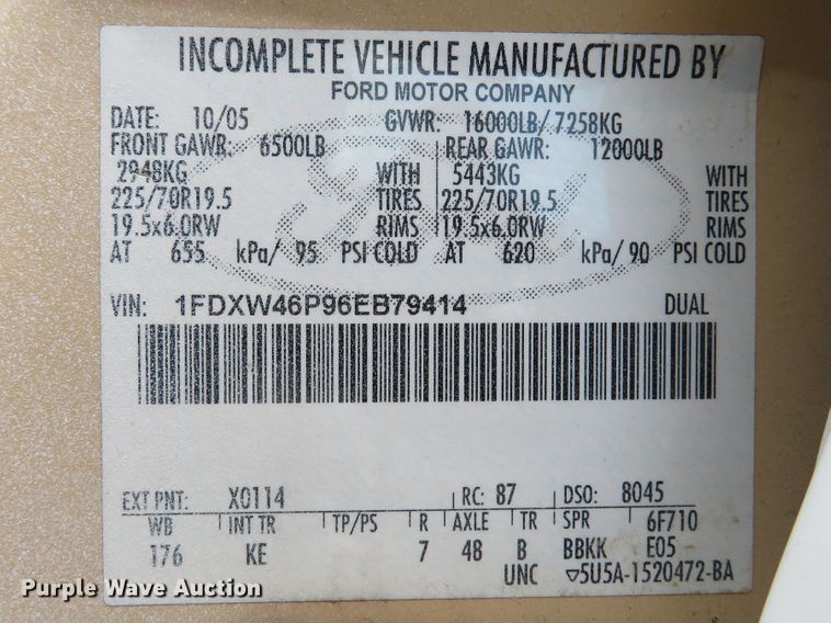 image for item DE8242 2006 Ford F450 Super Duty XL Crew Cab flat dump bed truck