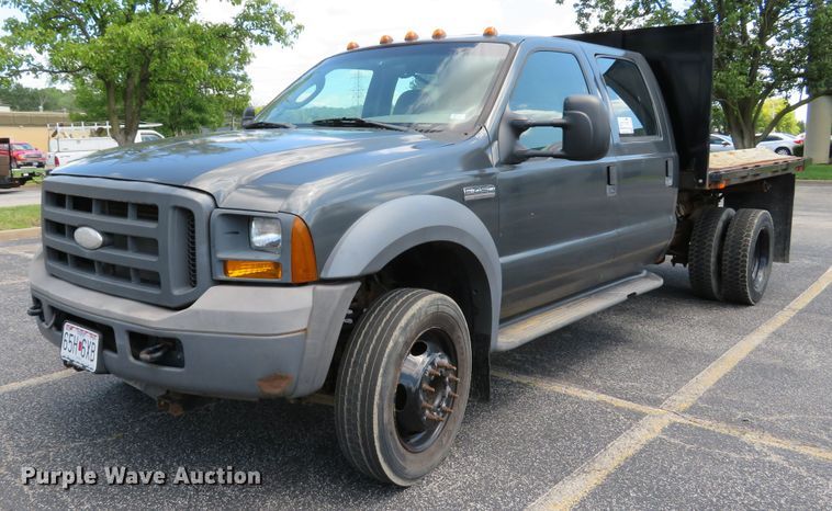 image for item DE8243 2005 Ford F450 Super Duty XL Crew Cab flat dump bed truck