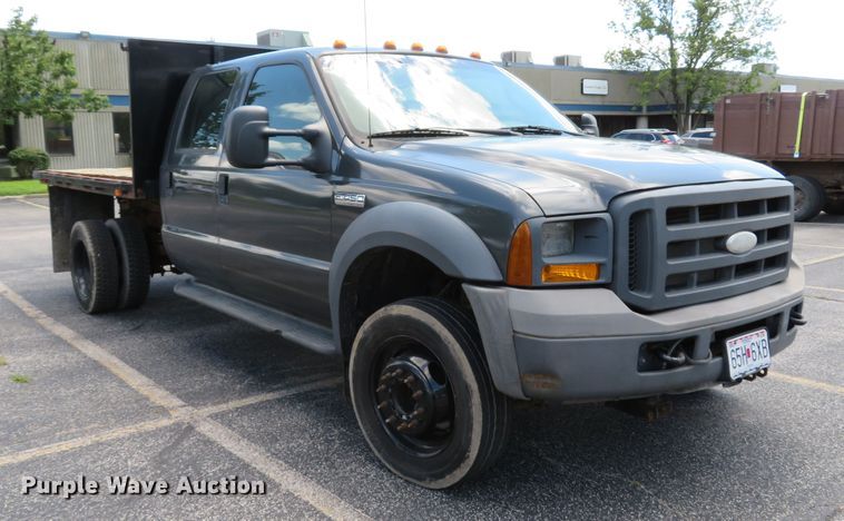 image for item DE8243 2005 Ford F450 Super Duty XL Crew Cab flat dump bed truck