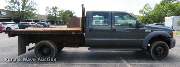 image for item DE8243 2005 Ford F450 Super Duty XL Crew Cab flat dump bed truck