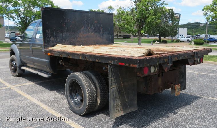 image for item DE8243 2005 Ford F450 Super Duty XL Crew Cab flat dump bed truck