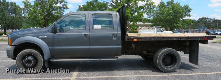 image for item DE8243 2005 Ford F450 Super Duty XL Crew Cab flat dump bed truck