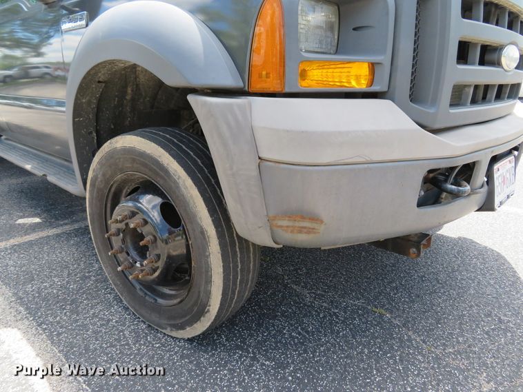 image for item DE8243 2005 Ford F450 Super Duty XL Crew Cab flat dump bed truck