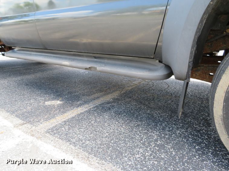 image for item DE8243 2005 Ford F450 Super Duty XL Crew Cab flat dump bed truck