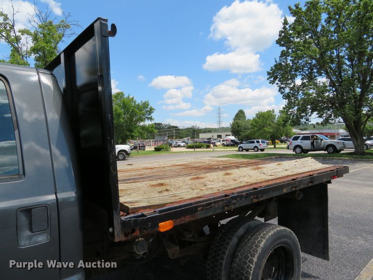 image for item DE8243 2005 Ford F450 Super Duty XL Crew Cab flat dump bed truck