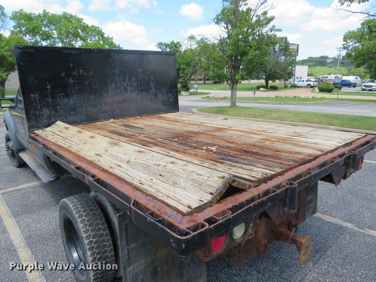 image for item DE8243 2005 Ford F450 Super Duty XL Crew Cab flat dump bed truck