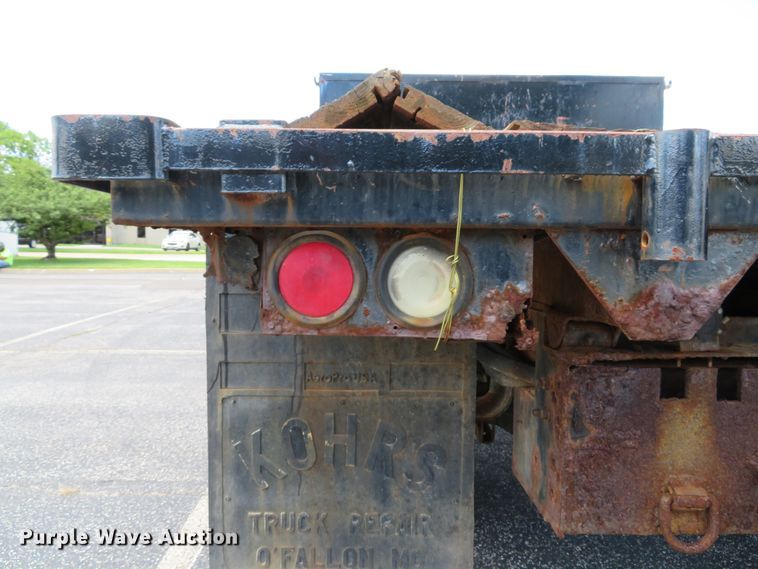 image for item DE8243 2005 Ford F450 Super Duty XL Crew Cab flat dump bed truck