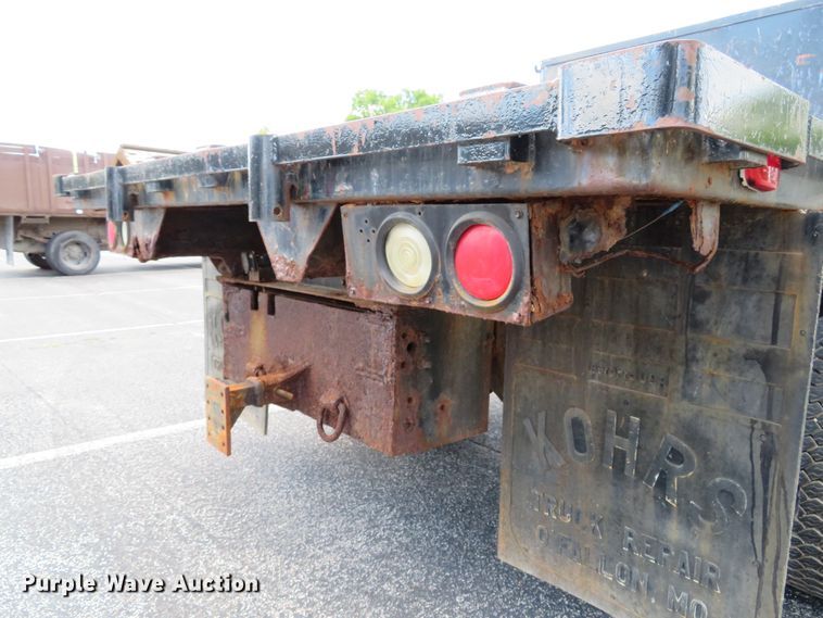 image for item DE8243 2005 Ford F450 Super Duty XL Crew Cab flat dump bed truck