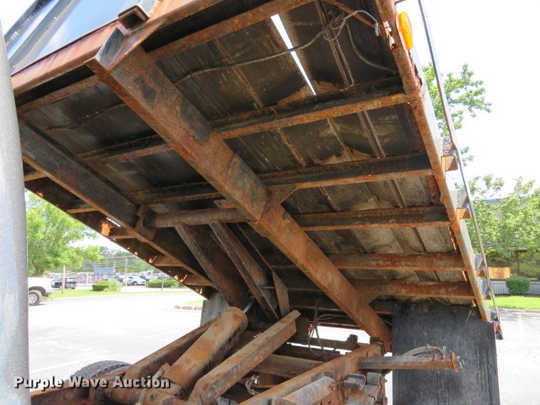 image for item DE8243 2005 Ford F450 Super Duty XL Crew Cab flat dump bed truck